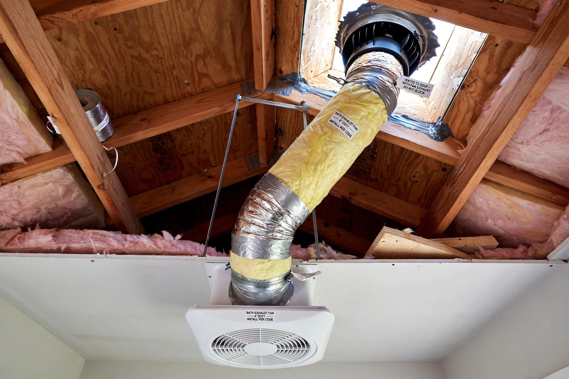 Bathroom exhaust fan properly vented through roof